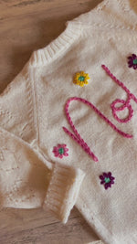 Load and play video in Gallery viewer, Personalised Soft White Heart Hand Embroidered Cardigan with Flowers
